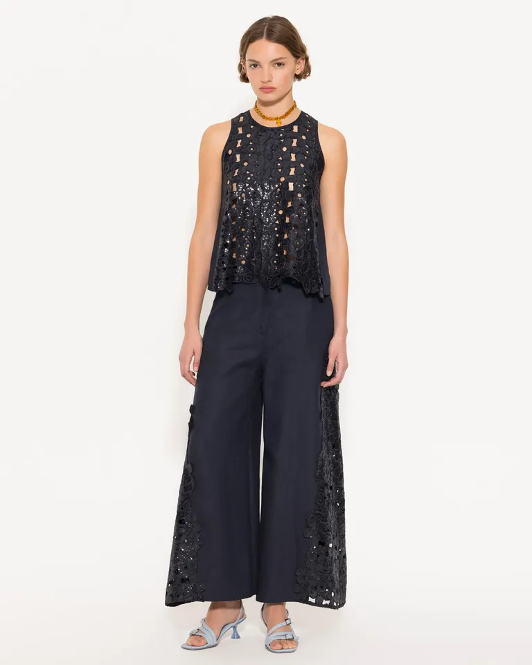 Pantalón de lino negro con diseño de broderie y lentejuelas para mujer de Jazmin Chebar en Pantalones para argentina