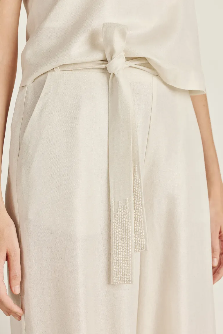 Pantalón de lino con lazo y bordado exclusivo para un look veraniego y sofisticado de Tucci en Pantalones para argentina