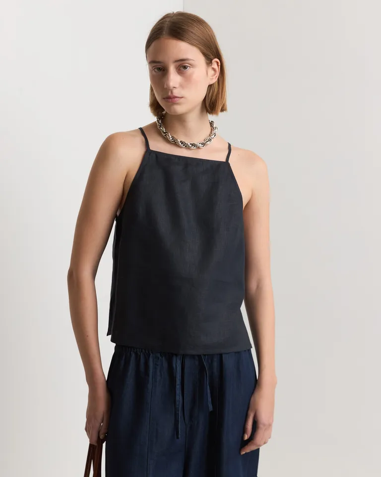 Top de lino negro con destellos metálicos - Diseño amplio y holgado de Prüne en Tops para argentina