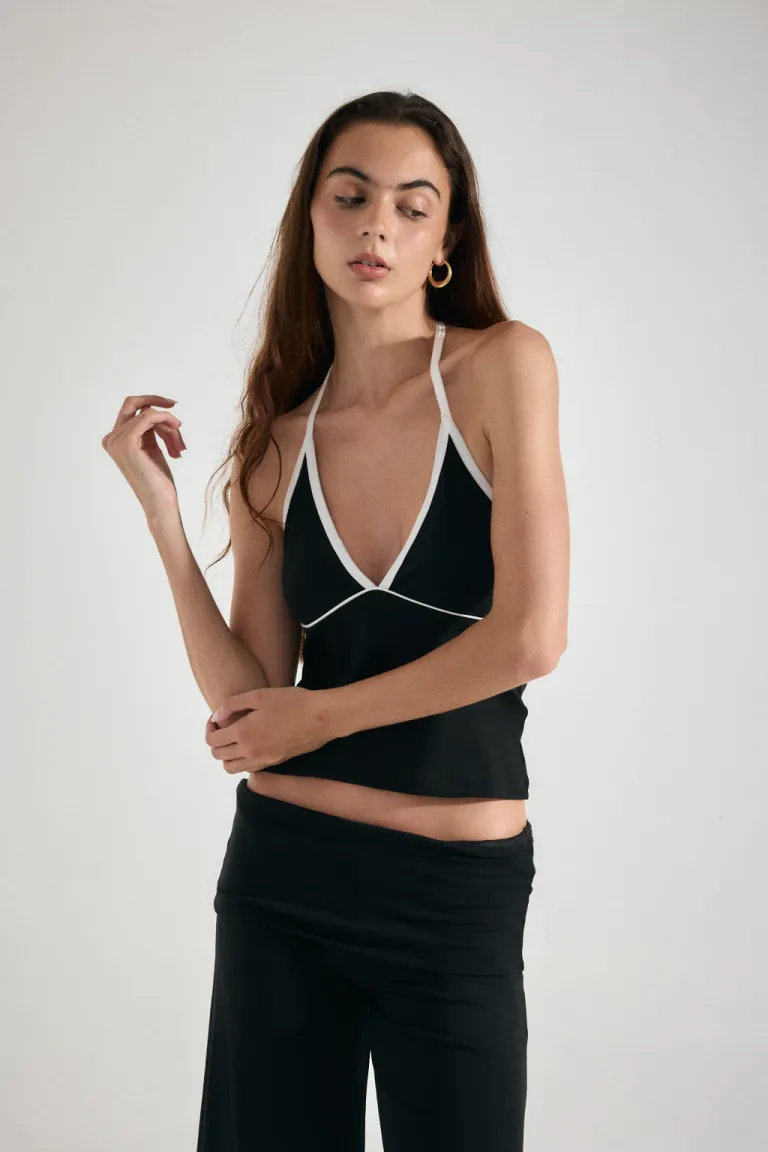 Top femenino con diseño combinado y detalles en contraste de Audaz en Tops para argentina