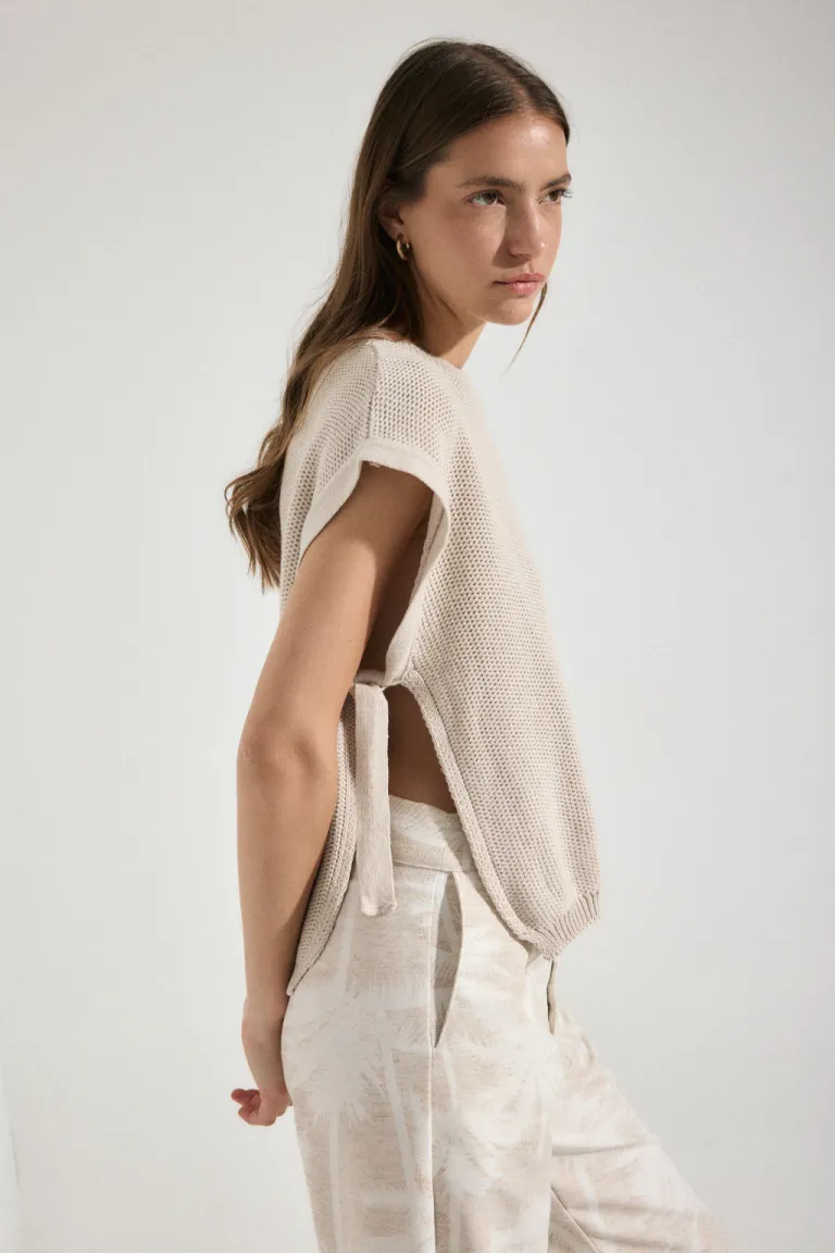 Chaleco tejido sin mangas con lazos, una prenda de moda versátil y cómoda para mujer de Audaz en Chalecos para argentina