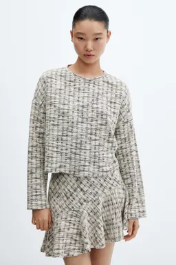 Falda tweed asimétrica de Mango en Faldas para argentina