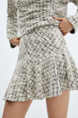 Falda tweed asimétrica de Mango en Faldas para argentina