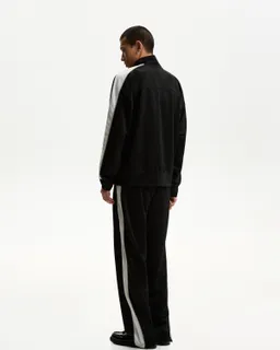 Pantalón técnico bordado de Bershka en Pantalones para argentina