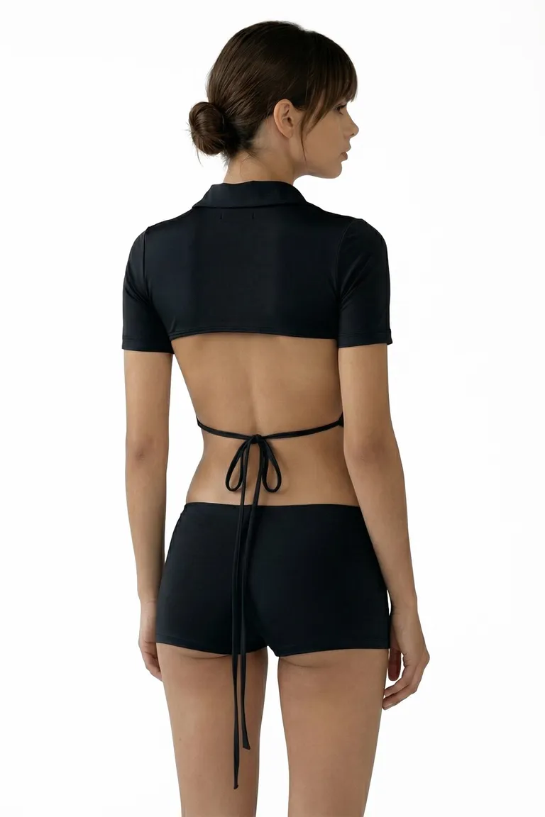 Mono negro de microfibra con detalles de apertura en la espalda de Black Mamba en Monos para argentina