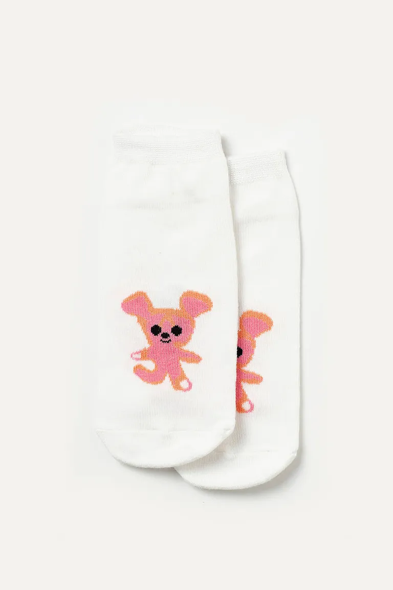 Medias con diseño de monstruito en contraste, un accesorio divertido y original para tu look cotidiano de 47 Street en Ropa Interior y Medias para argentina