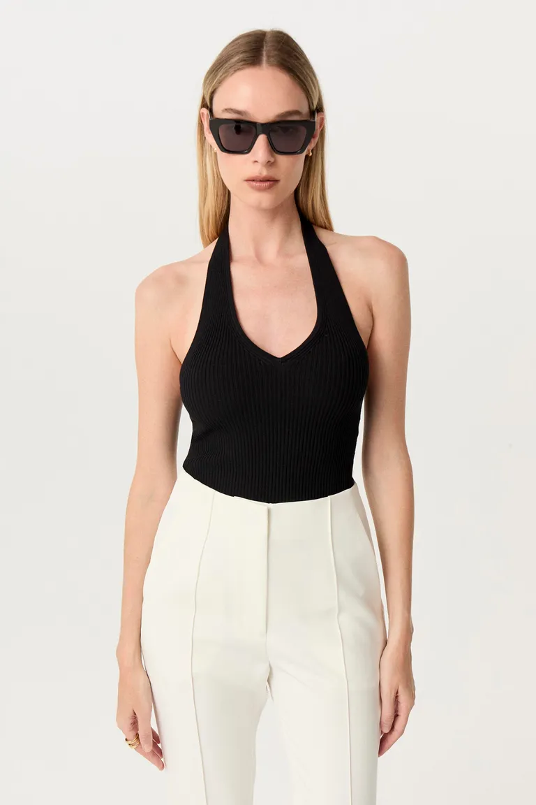 Top negro de punto acanalado con diseño halter y espalda abierta de Markova en Tops para argentina