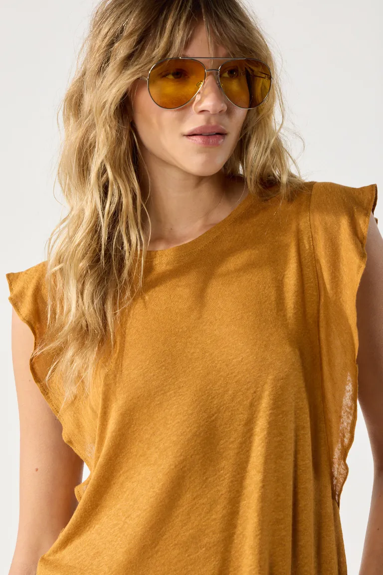 Remera lisa en jersey lino con cuello agregado y volados en sisas de Cuesta Blanca en Remeras para argentina