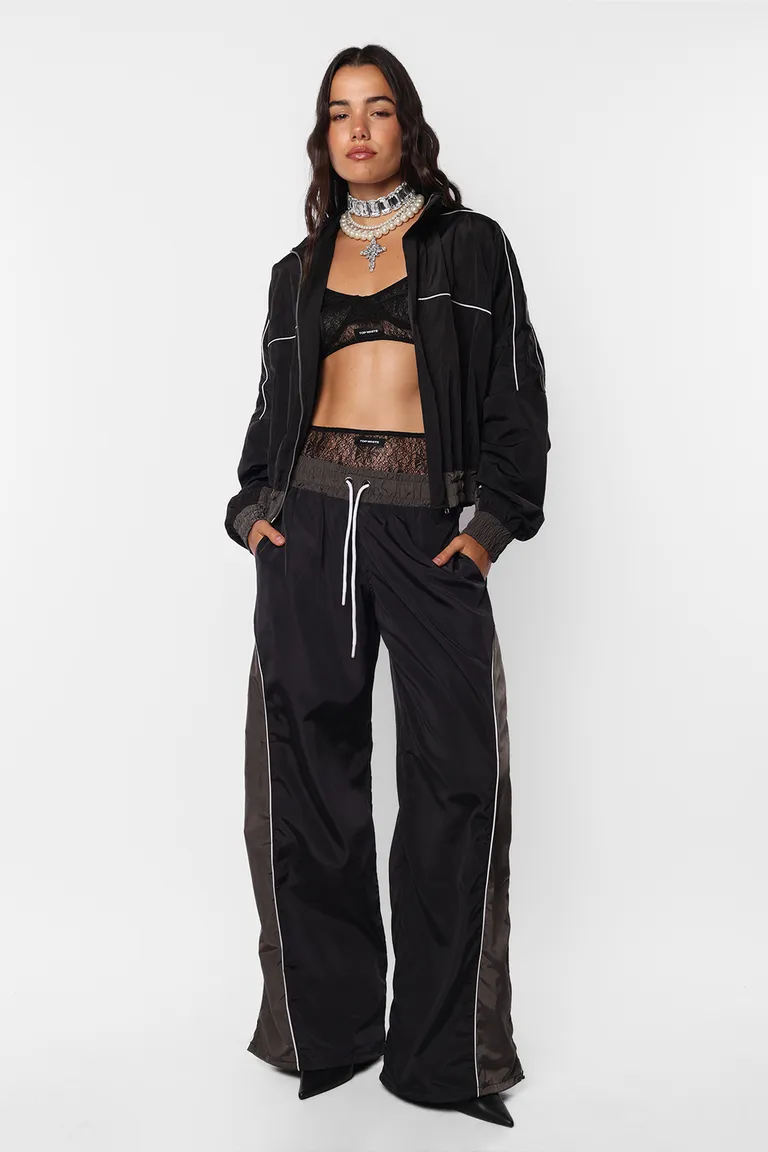 Pantalón deportivo bomber con detalles de recortes y vivos de Top White en Pantalones para argentina