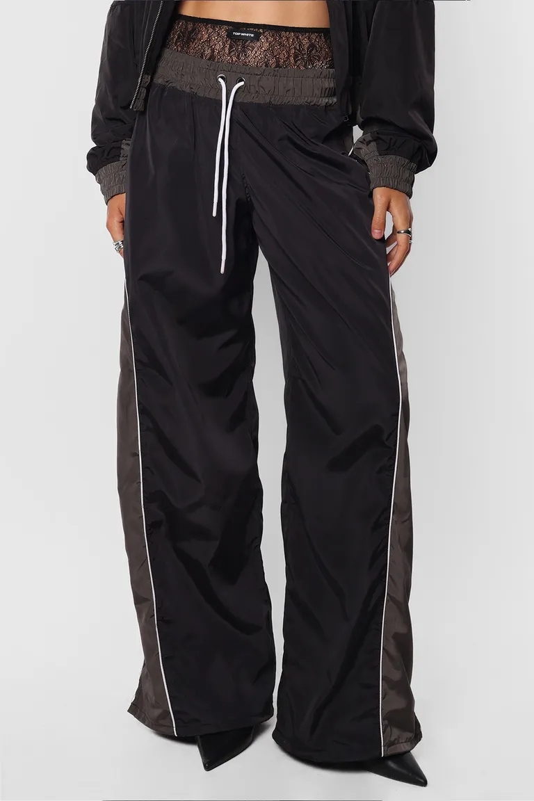 Pantalón deportivo bomber con detalles de recortes y vivos de Top White en Pantalones para argentina