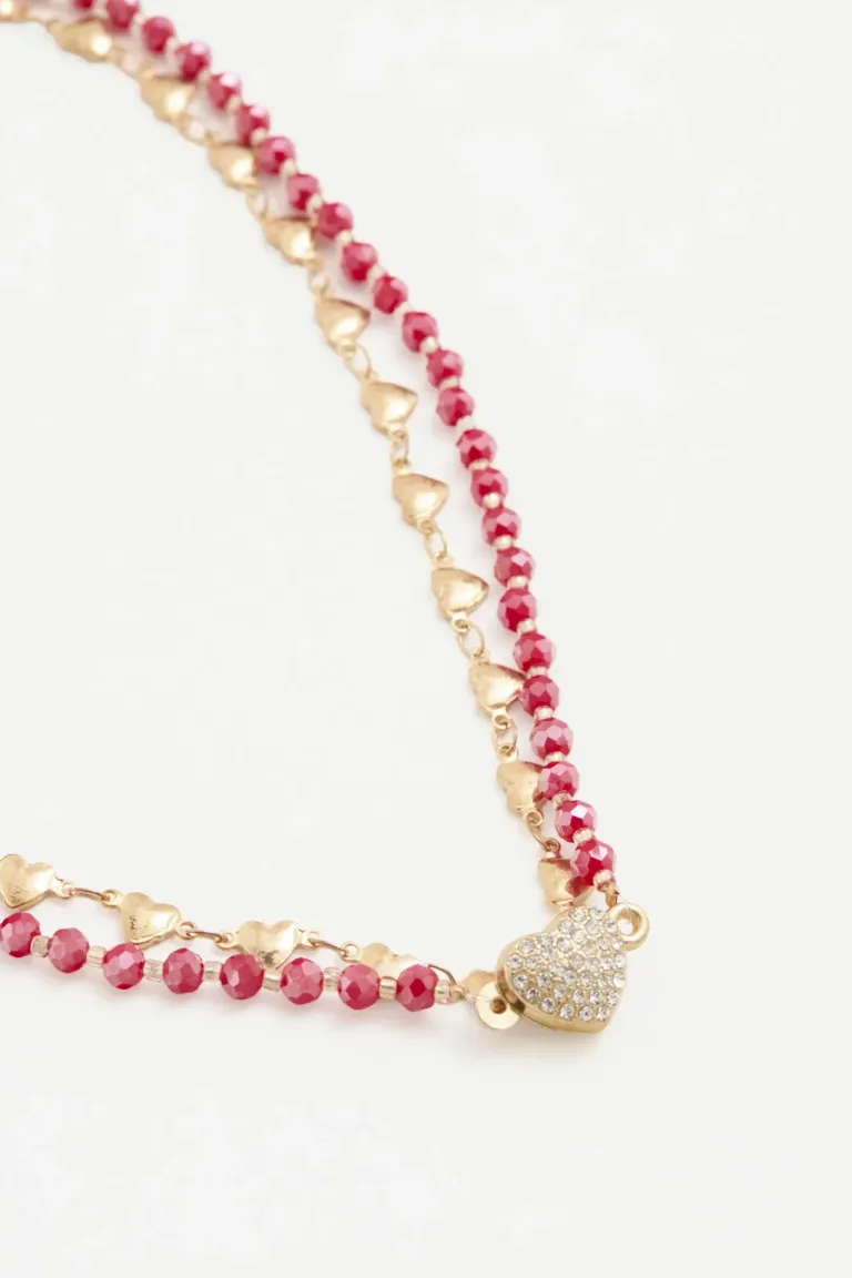 Collar doble de corazones metálicos y cadena con dije magnético de Rapsodia en Bijouterie para argentina
