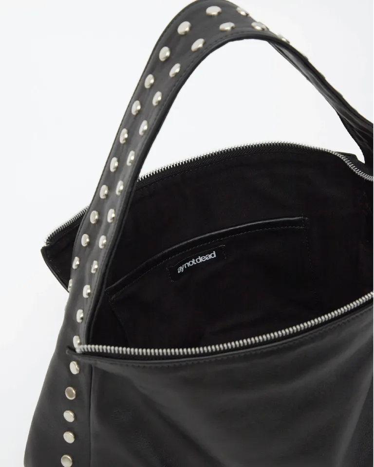 Cartera de cuero rectangular con tachas metálicas y manija continua de Ay Not Dead en Bolsos y Carteras para argentina