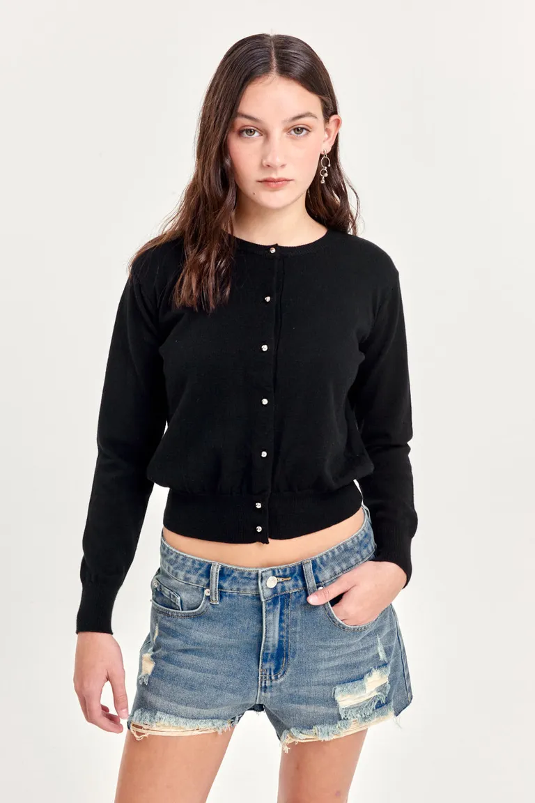 Shorts de denim de corte medio con lavado desgastado y roturas para un look artesanal y único de 47 Street en Shorts para argentina