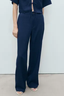 Pantalón denim fluido tiro alto de Mango en Pantalones para argentina