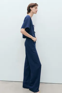 Pantalón denim fluido tiro alto de Mango en Pantalones para argentina