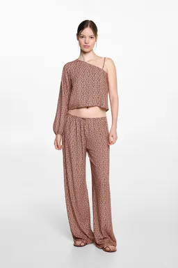 Pantalón fluido estampado de Mango Teen en Pantalones para argentina