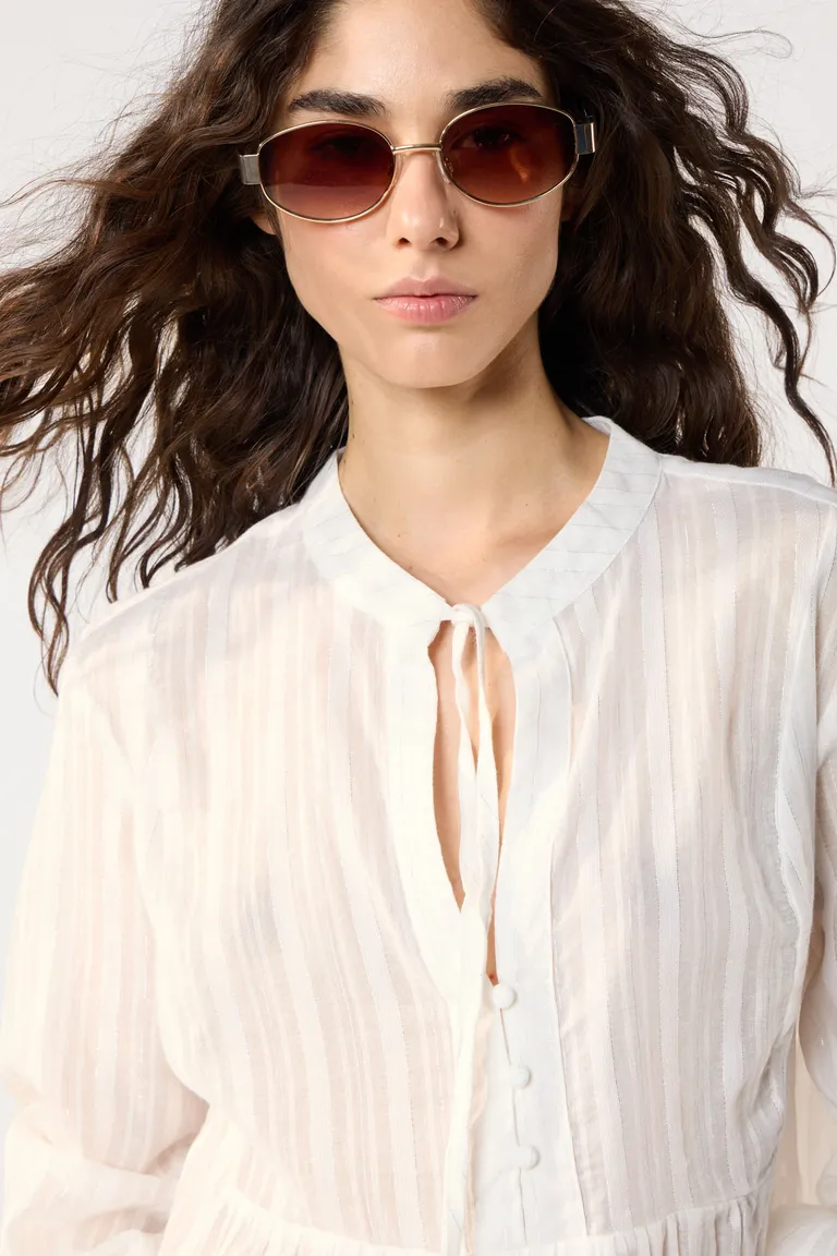 Blusa de algodón blanca con detalles de lurex y mangas globo de Cuesta Blanca en Blusas para argentina