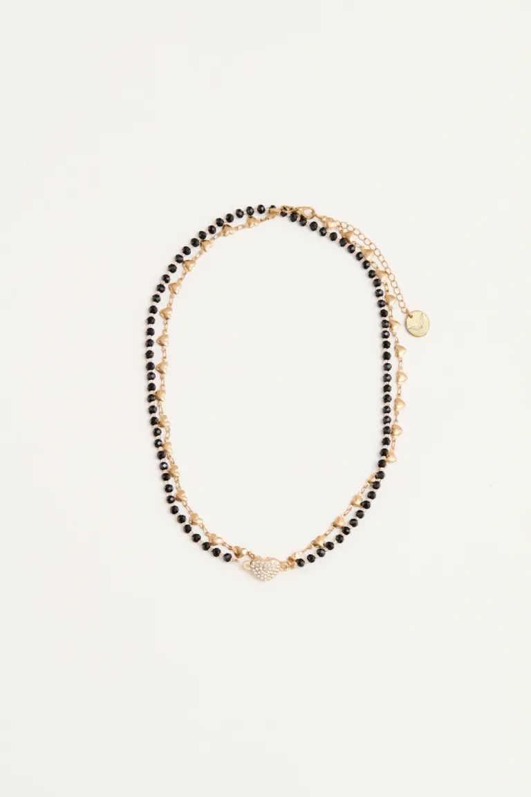 Collar de doble cadena con corazón magnético, una pieza elegante y versátil para realzar tu estilo de Rapsodia en Bijouterie para argentina