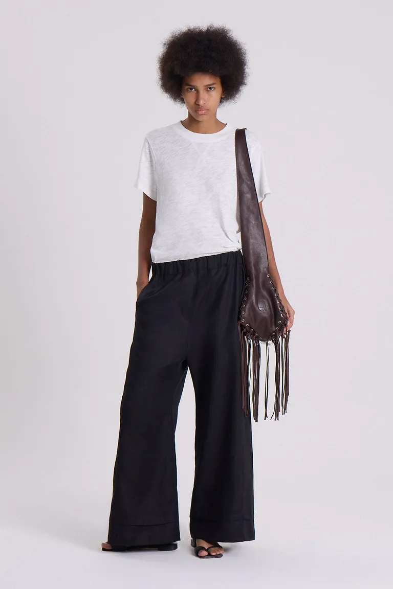 Pantalón amplio de lino de corte recto y cintura fruncida para un look veraniego y descontracturado de Maria Cher en Pantalones para argentina