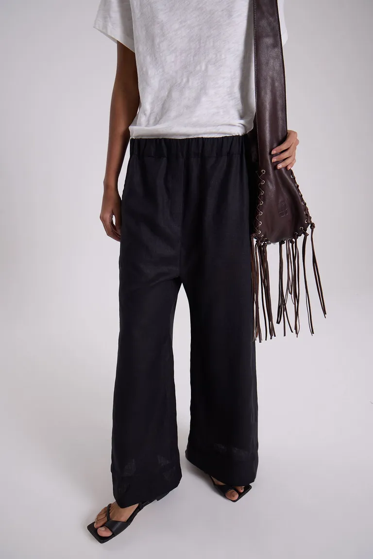 Pantalón amplio de lino de corte recto y cintura fruncida para un look veraniego y descontracturado de Maria Cher en Pantalones para argentina