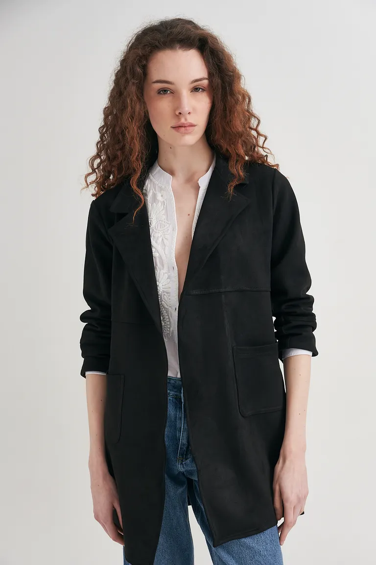 Abrigo negro de corte relajado con solapas amplias y bolsillos delanteros aplicados de Sweet en Tapados para argentina