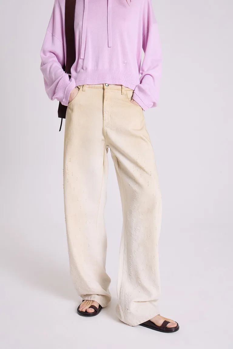 Pantalón de corte holgado en tonos beige con detalles de teñido y roturas de Maria Cher en Pantalones para argentina