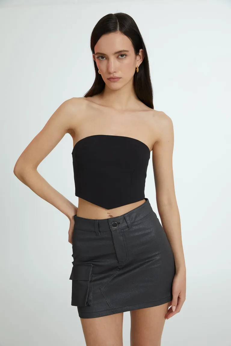 Falda metalizada con detalles de bolsillo y cierre - Diseño versátil y elegante de Naíma en Faldas para argentina