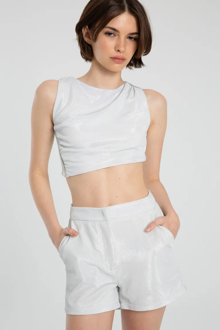 Top blanco con diseño modular y detalle de strass en los hombros de Naíma en Tops para argentina