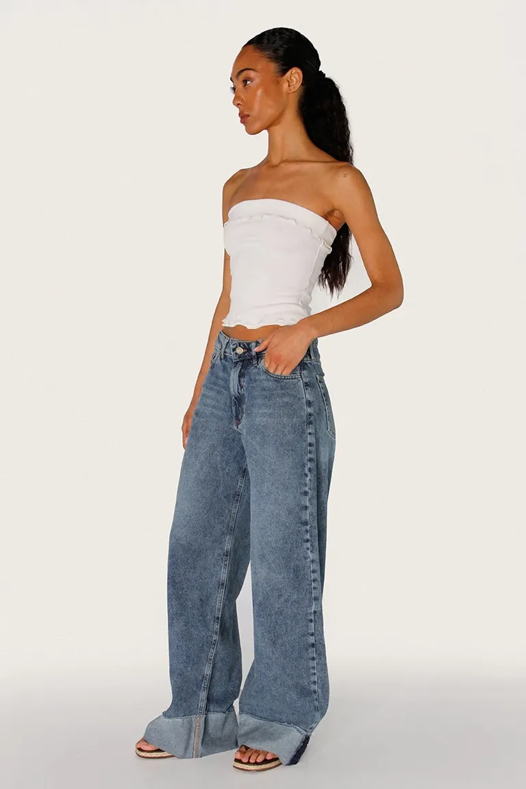 Pantalón de jean amplio de tiro medio con diseño rag y ruedo ancho rebatido de Sofia Sarkany en Pantalones para argentina