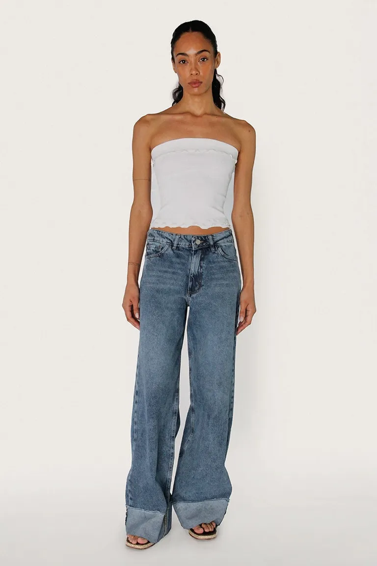 Pantalón de jean amplio de tiro medio con diseño rag y ruedo ancho rebatido de Sofia Sarkany en Pantalones para argentina