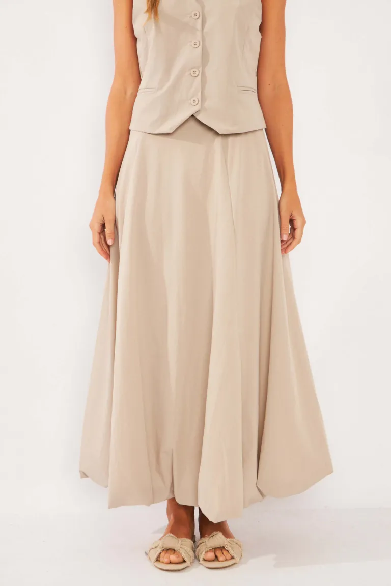 Falda sastrera en color blanco con diseño globo para un look sofisticado y elegante de Belle en Faldas para argentina