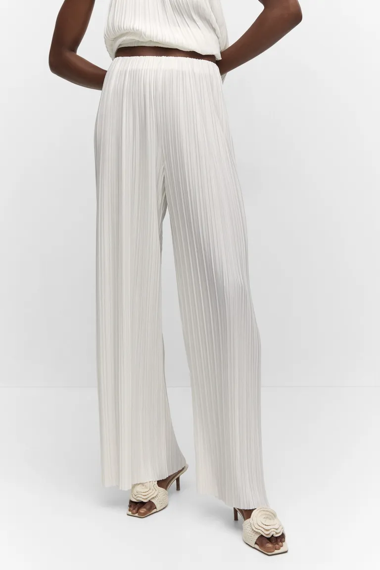 Pantalón wideleg plisado de Mango en Pantalones para argentina