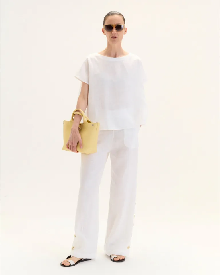 Top evasé de corte suelto con mangas cortas y detalle de abotonadura en la espalda de Blue Sheep en Tops para argentina