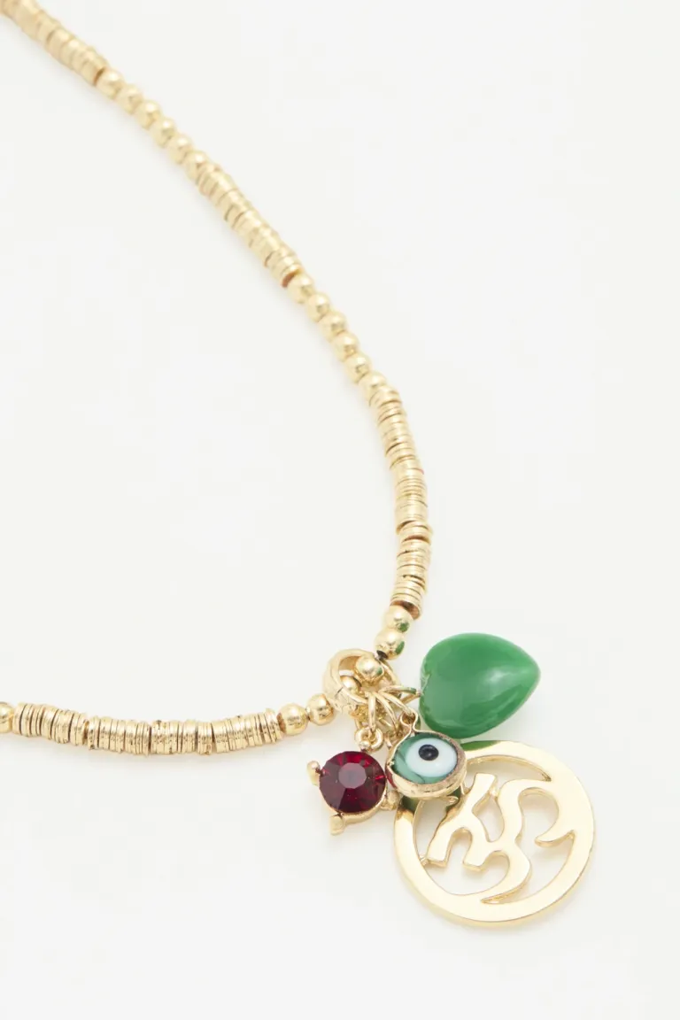 Collar de lentejuelas con dijes decorativos y borla de Rapsodia en Bijouterie para argentina