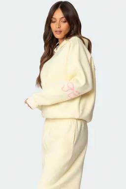 Buzo con moño decorativo de Edikted en Buzos y Sweaters para argentina