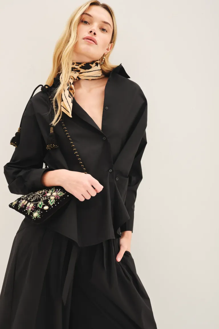 Blusa de popelina de corte amplio y botones laterales para crear distintas siluetas de Rapsodia en Camisas para argentina