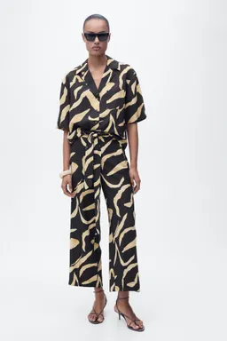 Pantalón recto estampado cinturón de Mango en Pantalones para argentina