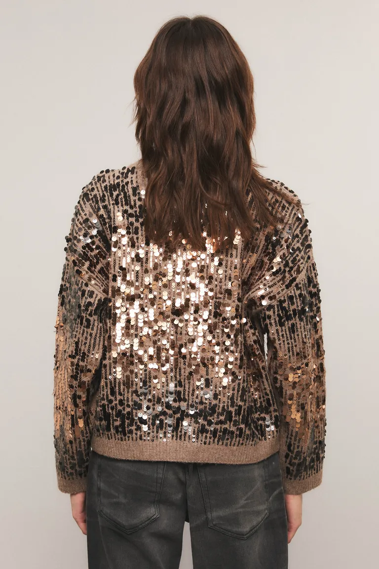 Sweater de cuello redondo con diseño de calce relajado y detalles de lentejuelas en toda la prenda de Kosiuko en Buzos y Sweaters para argentina