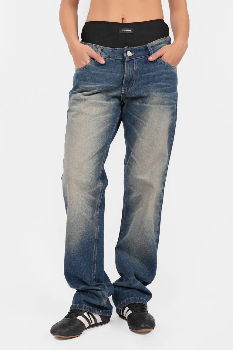 Pantalón denim de tiro bajo y pierna angosta con detalles artesanales de Top White en Pantalones para argentina