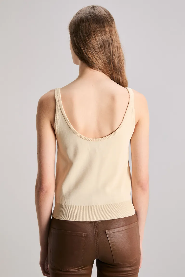 Top de punto jersey con detalles en lurex y avio personalizado de Kosiuko en Tops para argentina