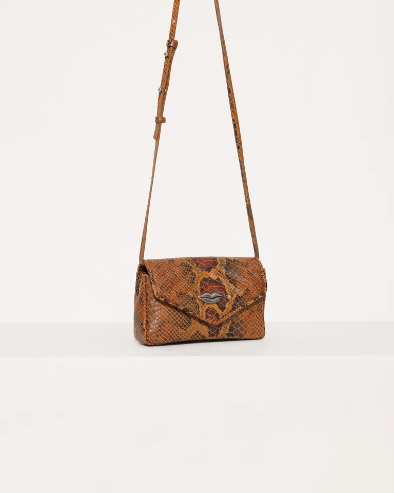 Bandolera de cuero con detalles estampados en tonos marrones de Jazmin Chebar en Bolsos y Carteras para argentina