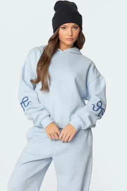 Buzo con moño decorativo de Edikted en Buzos y Sweaters para argentina