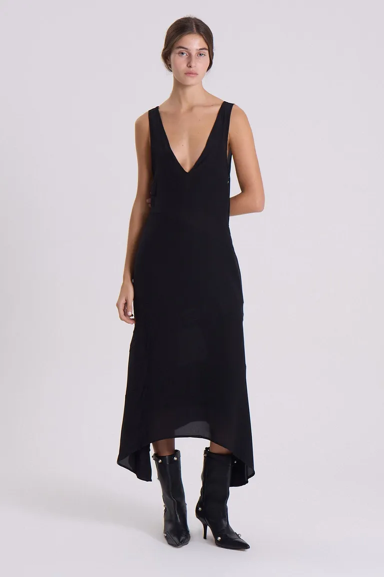 Sofisticado vestido de seda negro de corte midi con escote en V de Maria Cher en Vestidos para argentina
