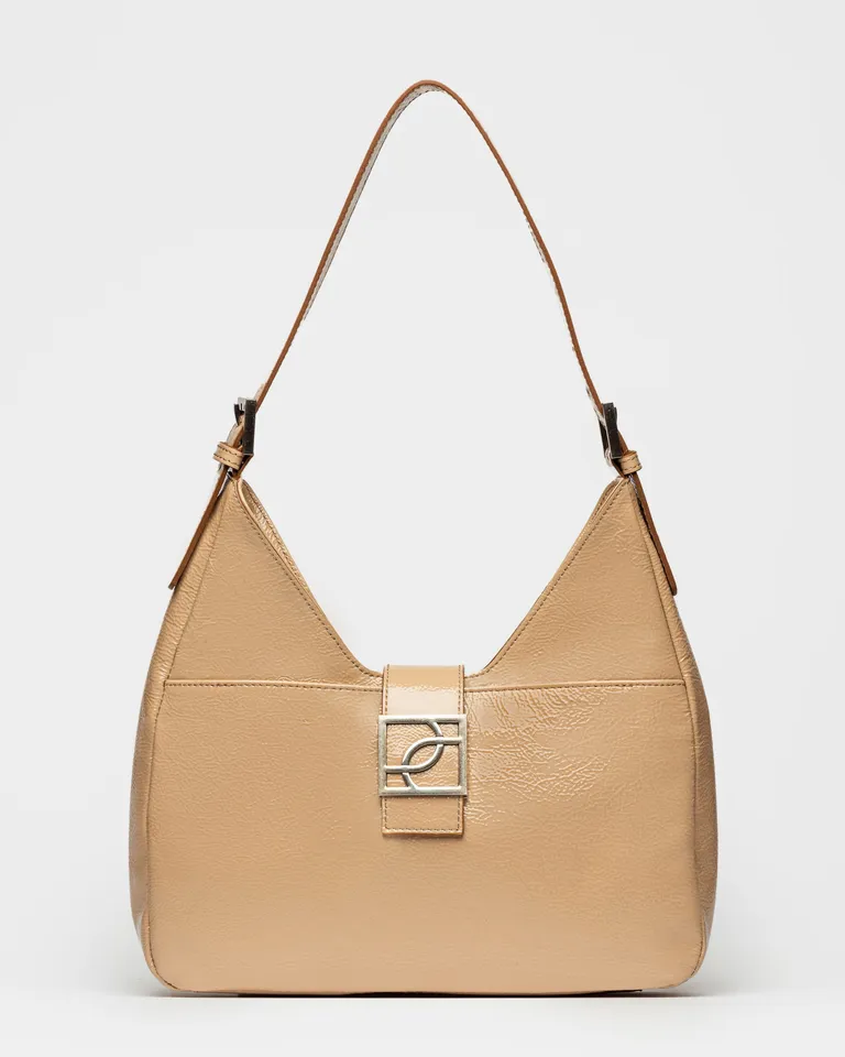 Bolso de cuero en color beige con cierre metálico, de la línea signature de Prüne en Bolsos y Carteras para argentina