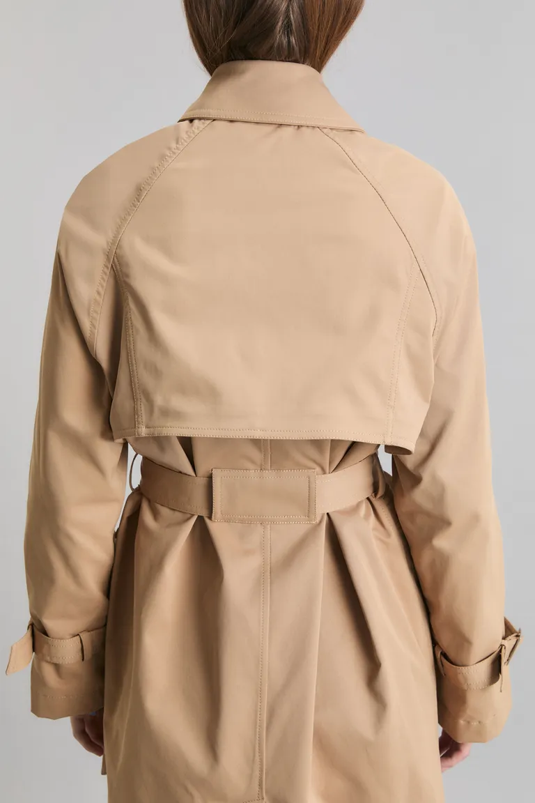 Trench Camelia: Abrigo impermeable de largo midi con diseño atemporal para mujer de Kosiuko en Tapados para argentina