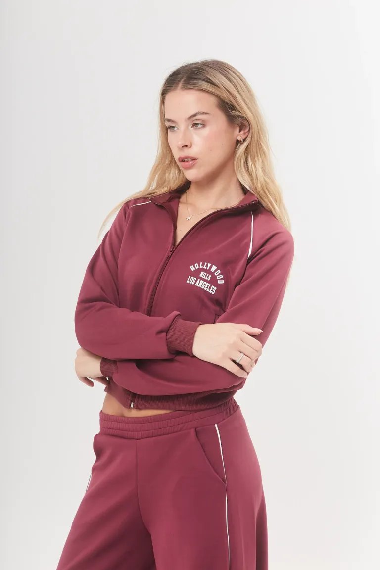 Chaqueta negra de tela yoga con estampa en la espalda - Prenda versátil y cómoda para lucir estilo casual de Belle en Chaquetas para argentina