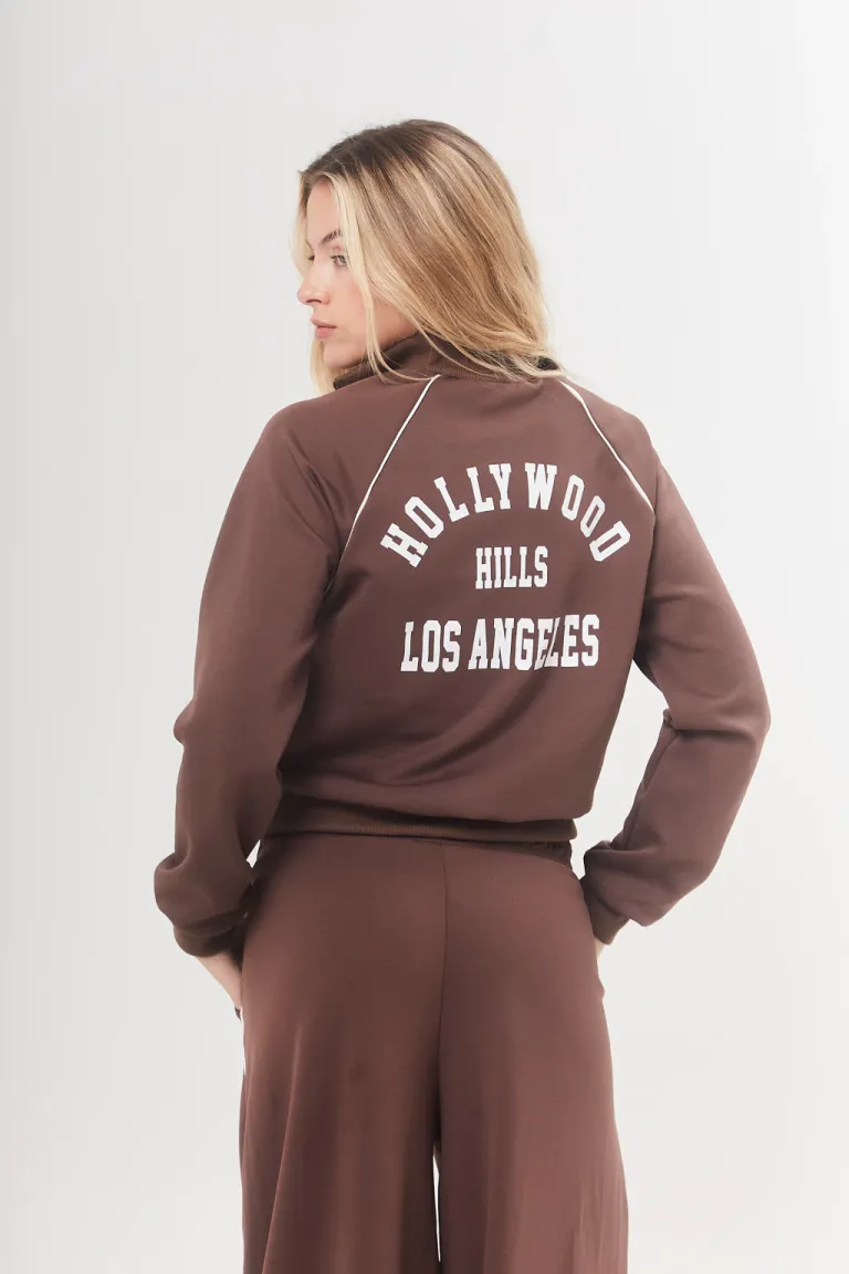 Chaqueta negra de tela yoga con estampa en la espalda - Prenda versátil y cómoda para lucir estilo casual de Belle en Chaquetas para argentina