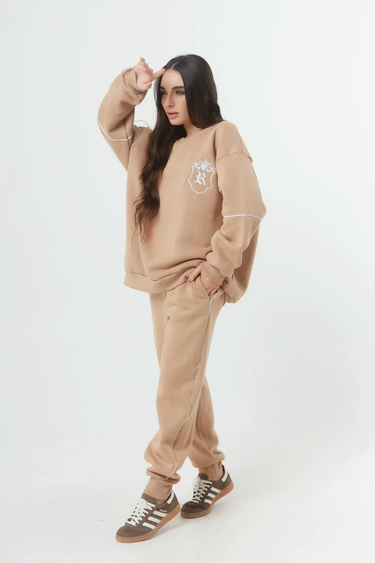 Pantalón jogger frisa con vivo lateral y puño rib en tonos neutros de Belle en Pantalones para argentina