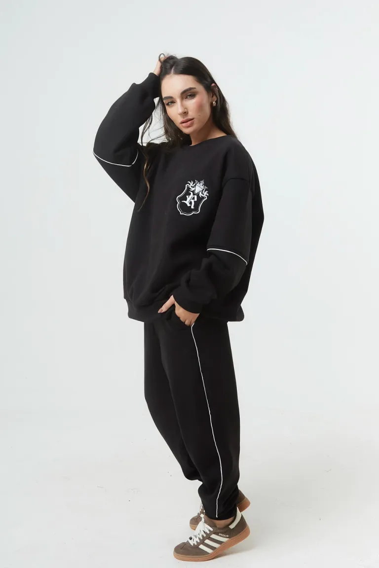 Pantalón jogger frisa con vivo lateral y puño rib en tonos neutros de Belle en Pantalones para argentina