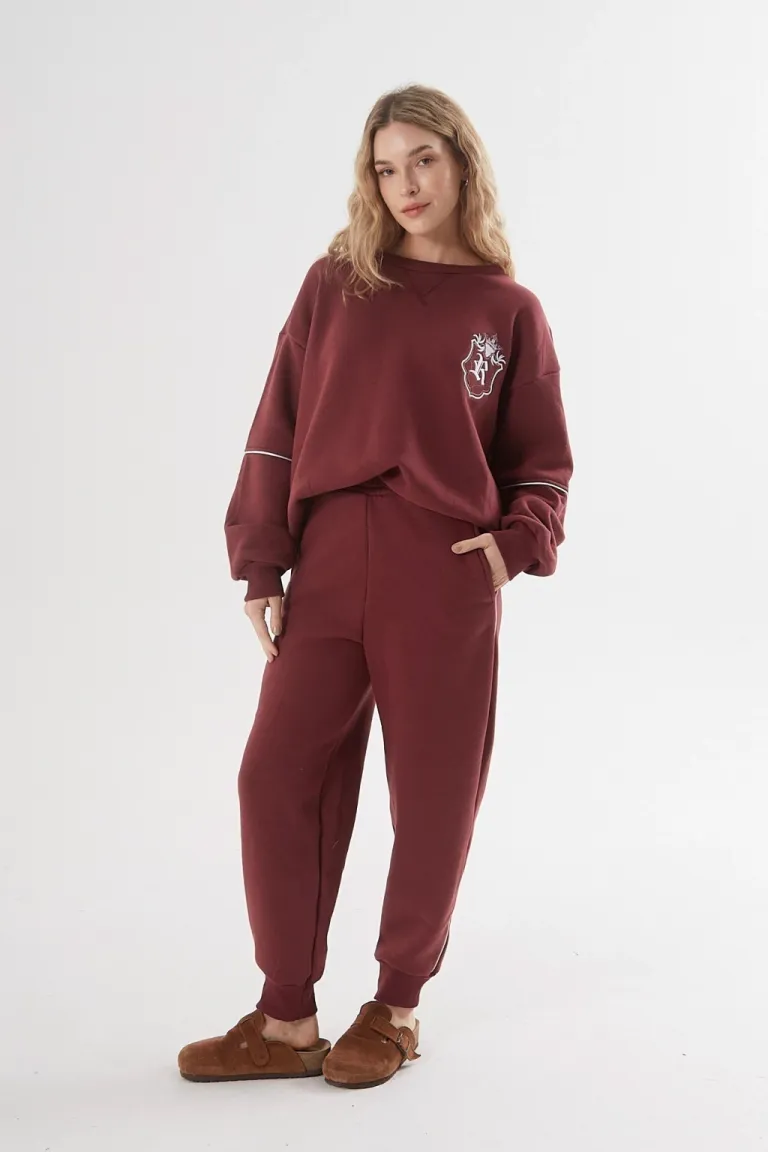 Pantalón jogger frisa con vivo lateral y puño rib en tonos neutros de Belle en Pantalones para argentina